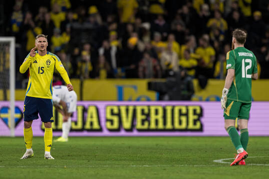 Carl Starfelt of Sweden and goalkeeper Viktor Johansson of