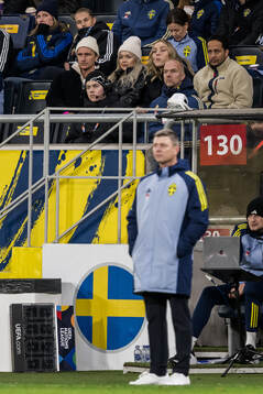Kristoffer Olsson with family in the stands