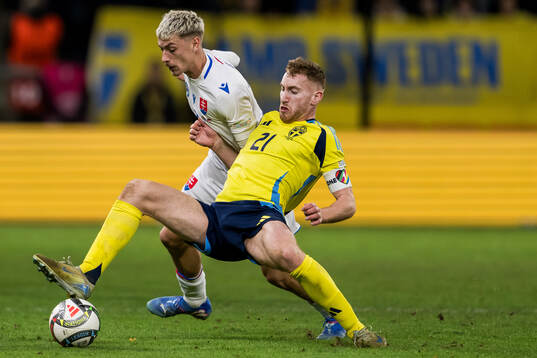 Tomas Rigo of Slovakia and Dejan Kulusevski of Sweden