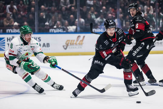 Rögles Linus Sandin och Malmö Redhawks Johan Olofsson
