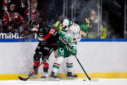 Malmö Redhawks Lassi Thomson och Rögles Carter Ashton