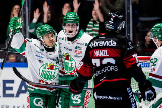 Rögles Leon Bristedt och Jacob Peterson jublar