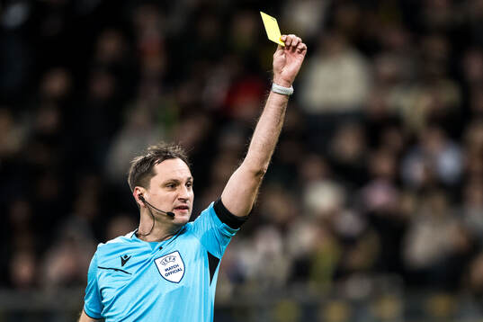 Referee Mykola Balakin