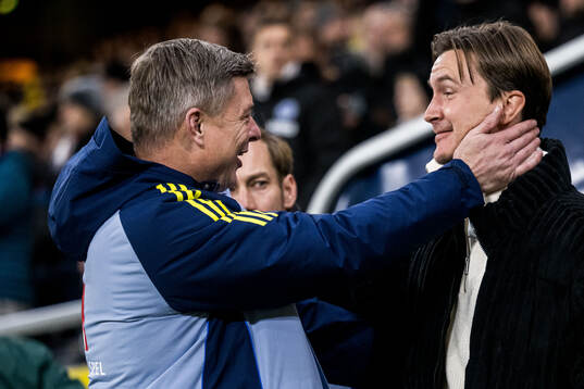 Head coach Jon Dahl Tomasson of Sweden and Kristoffer Olsson