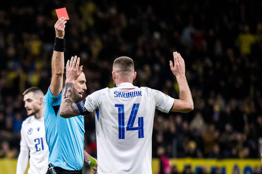 Milan Skriniar of Slovakia receives a red card