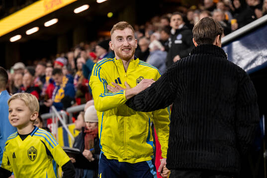 Dejan Kulusevski of Sweden and Kristoffer Olsson
