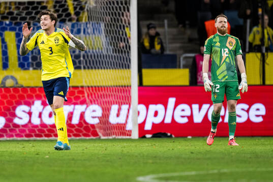 Victor Nilsson Lindelöf and goalkeeper Viktor Johansson of
