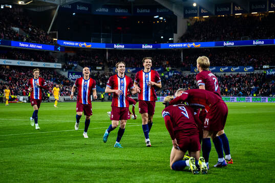 Players of Norway celebrate 1-0. By Erling Braut Haaland