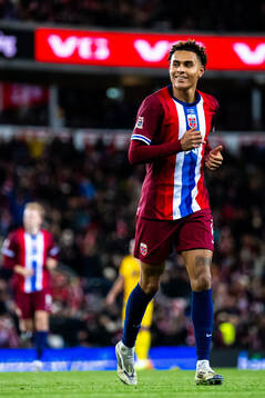 Antonio Nusa of Norway celebrates scoring 5-0