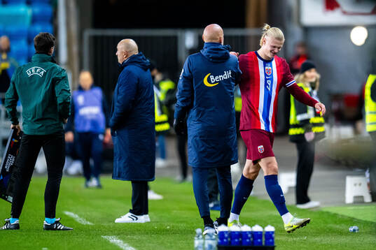 Head coach Ståle Solbakken and Erling Braut Haaland of