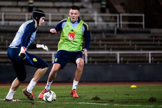 Goalkeeper Jacob Widell Zetterström and Emil Holm of the