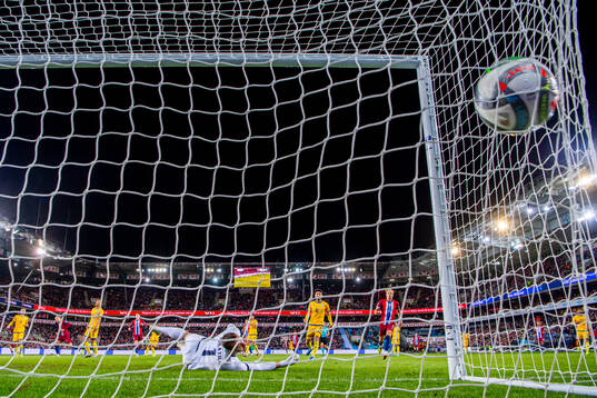 Erling Braut Haaland of Norway scores the 4-0 goal behind