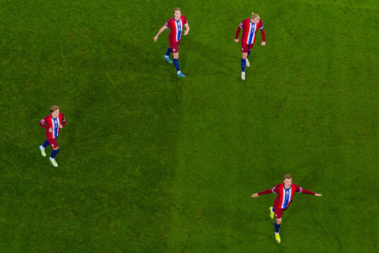 Alexander Sørloth of Norway celebrates with teammates