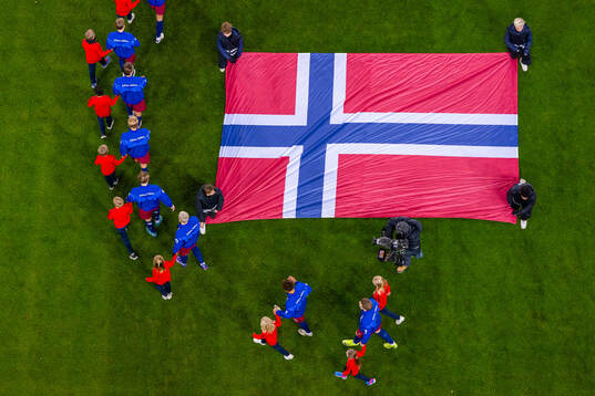 Players of Norway enter the pitch