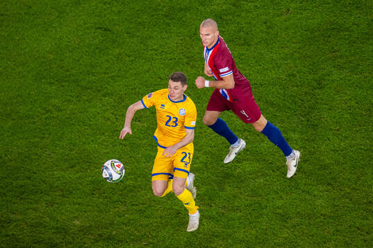 Islam Chesnokov of Kazakhstan and Leo Østigård of Norway