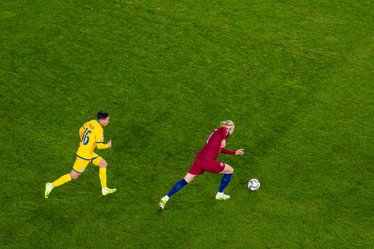 Yerkin Tapalov of Kazakhstan and Erling Braut Haaland of