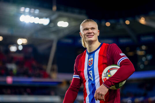 Erling Braut Haaland of Norway with the match ball
