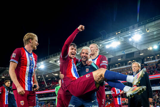 Jørgen Strand Larsen and Aron Dønnum of Norway celebrate