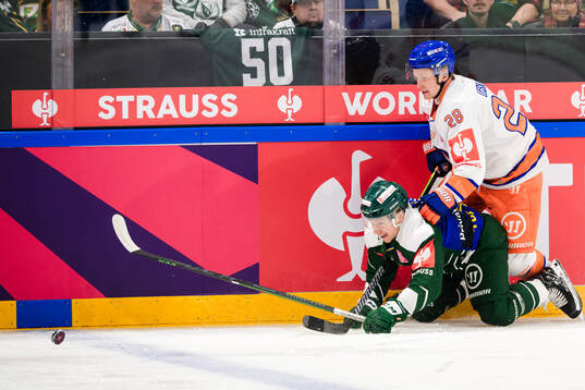 Oscar Steen of Färjestad  and Otto Leskinen of Tappara