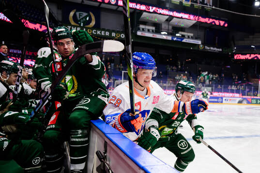 Viktor Lodin of Färjestad  and Otto Leskinen of Tappara