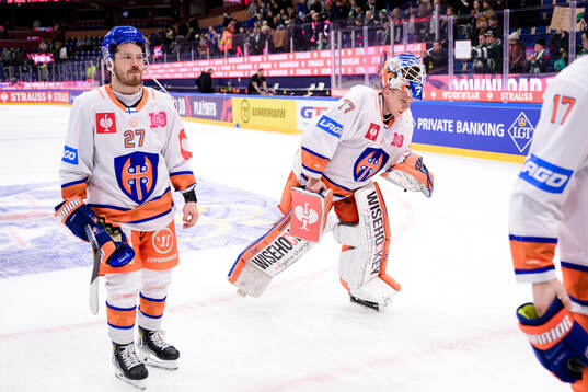 Kristian Tanus and goaltender Juha Metsola of Tappara