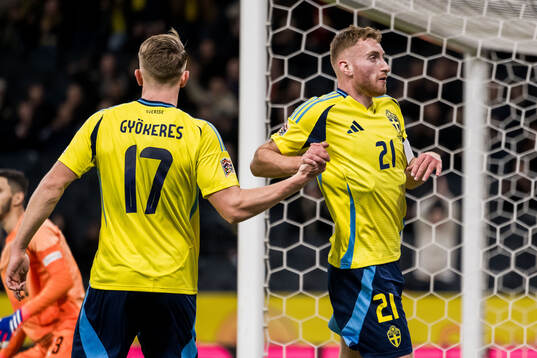 Dejan Kulusevski of Sweden celebrates with Viktor Gyökeres