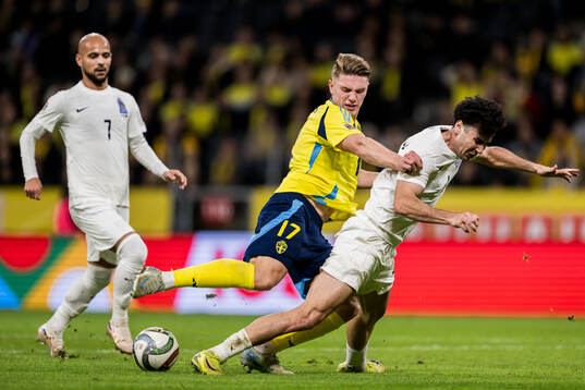 Viktor Gyökeres of Sweden and Anton Krivotsyuk of