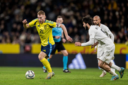 Dejan Kulusevski of Sweden and Joshgun Diniyev of Azerbaijan