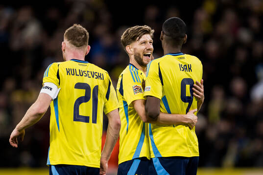 Alexander Isak of Sweden celebrates with Anton Salétros