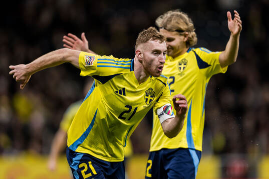 Dejan Kulusevski of Sweden celebrates with Sebastian Nanasi