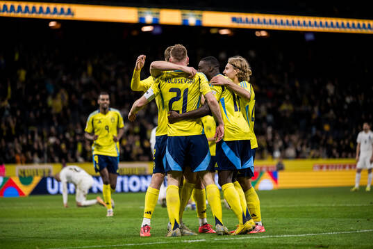 Dejan Kulusevski of Sweden celebrates with team mates