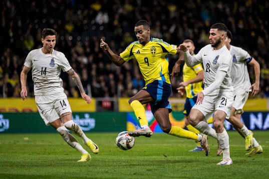 Alexander Isak of Sweden against Mahir Emreli and Elvin