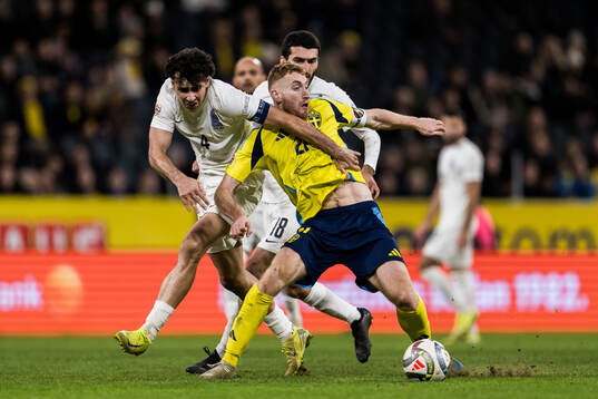 Dejan Kulusevski of Sweden against Anton Krivotsyuk and