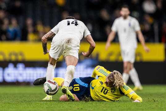 Emil Forsberg of Sweden and Mahir Emreli of Azerbaijan