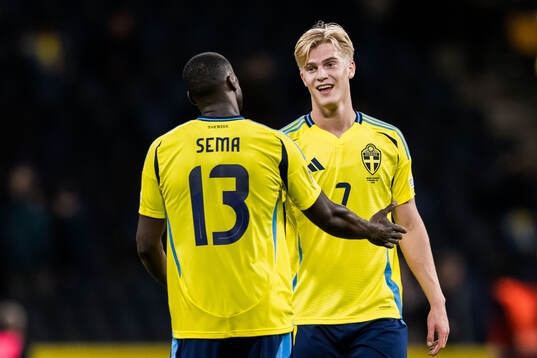 Ken Sema and Lucas Bergvall of Sweden celebrate