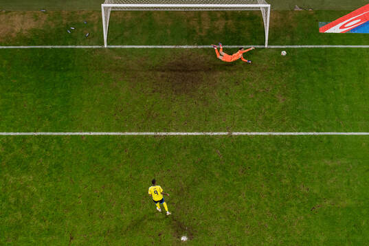 goalkeeper Shakhrudin Magmomedaliyev of Azerbaijan saves a