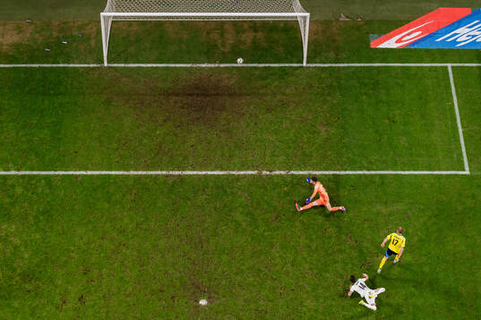 Viktor Gyökeres of Sweden scores 5-0 against goalkeeper
