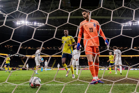 goalkeeper Elvin Jafarguliyev of Azerbaijan looks dejected