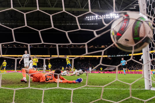 Alexander Isak of Sweden scores a goal that is later