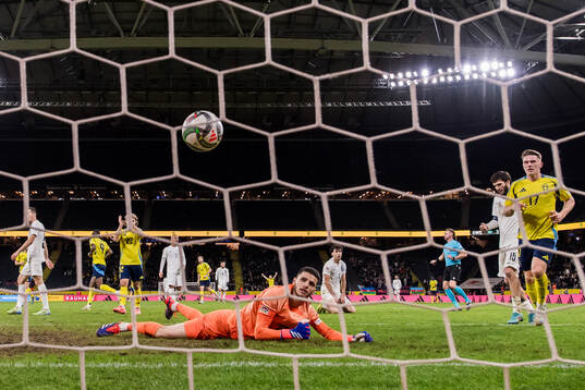 Alexander Isak of Sweden scores a goal that is later