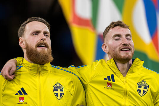 goalkeeper Viktor Johansson and Dejan Kulusevski of Sweden
