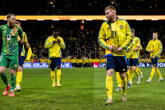 goalkeeper Viktor Johansson and Dejan Kulusevski of Sweden