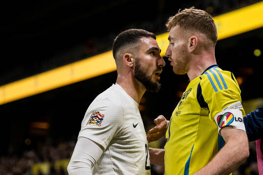 Elvin Jamalov of Azerbaijan and Dejan Kulusevski of Sweden