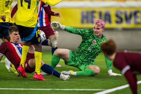 Anders Børset and Goalkeeper Magnus Stær-Jensen of Norway