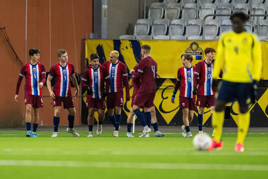 Adrian Kurd Rønning of Norway celebrates