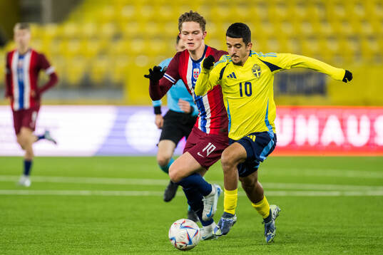 Gustav Kjølstad Nyheim of Norway and Zakaria Loukili of
