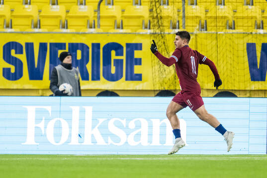 Adrian Kurd Rønning of Norway celebrates