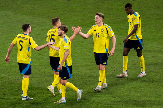 Anton Salétros and Viktor Gyökeres of Sweden celebrate