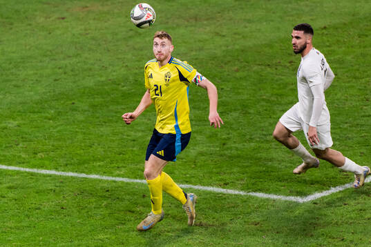 Dejan Kulusevski of Sweden and Elvin Jamalov of Azerbaijan