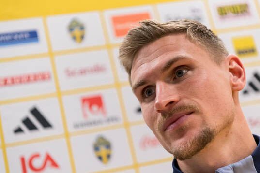 Carl Starfelt of Sweden in mixed zone
